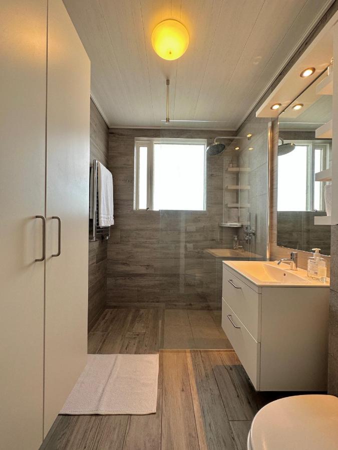 Waterfront Fjord House Hotel Arskogssandur Bagian luar foto